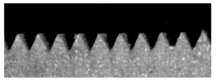 Microstructured layer according to the invention